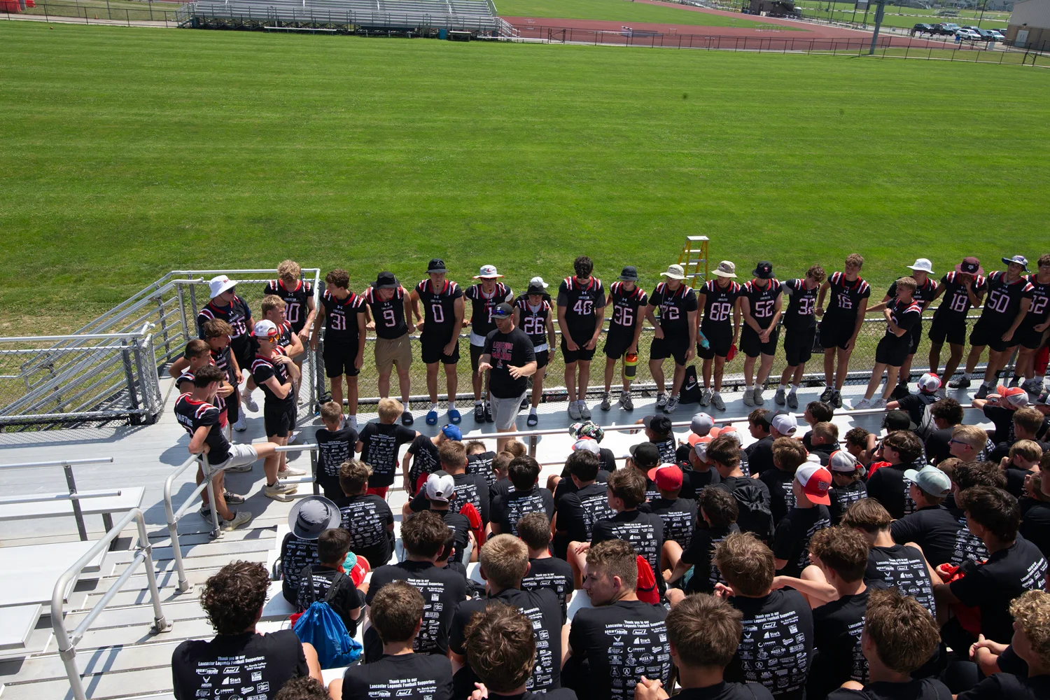 Coach Mansell talking to the campers at the Lancaster Football Camp 2026