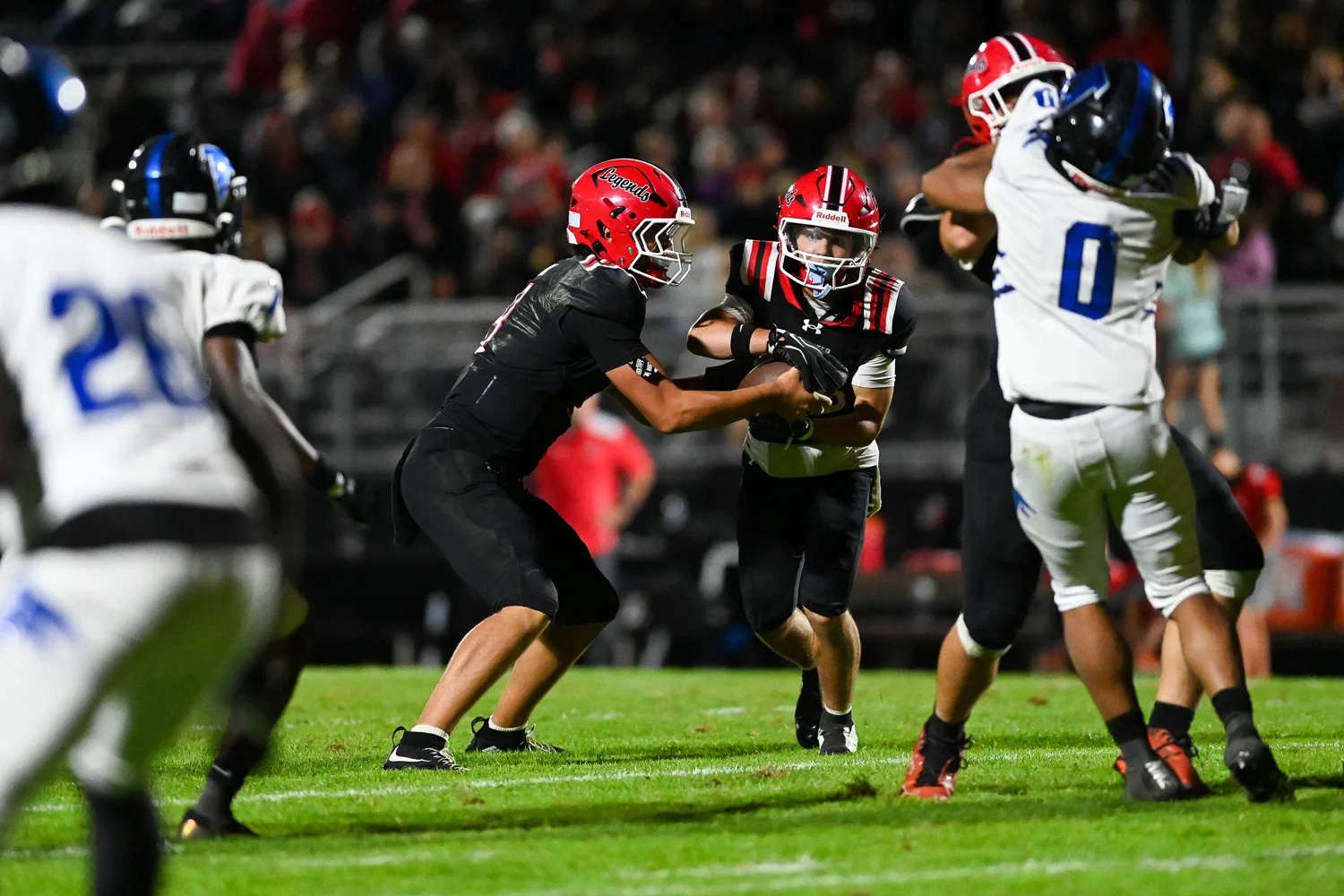 RB getting the handoff from the QB