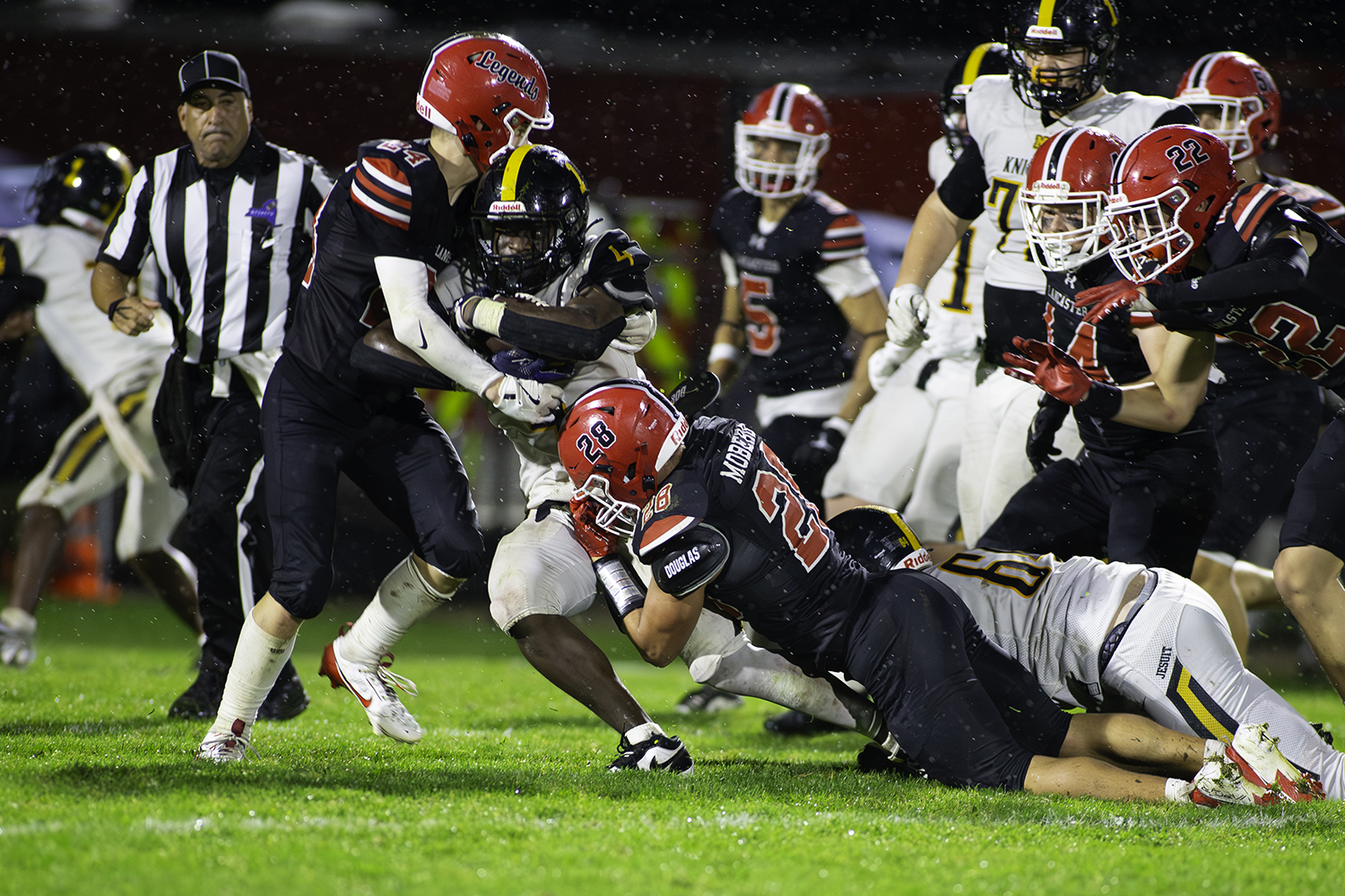 Legends making the tackle against McQuaid