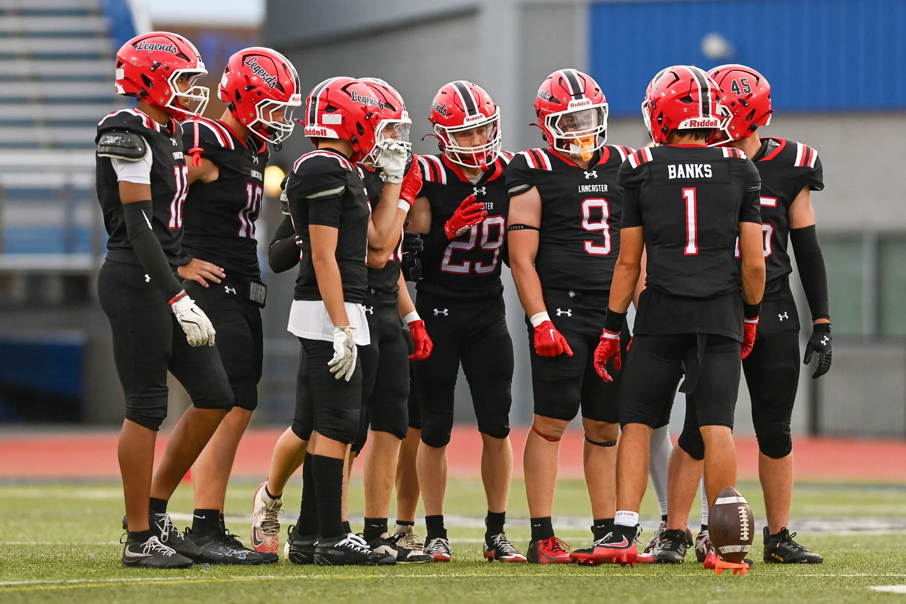 Lancasetr huddle up during the game against McQuaid
